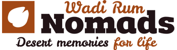 logo of wadi rum nomads with its slogan